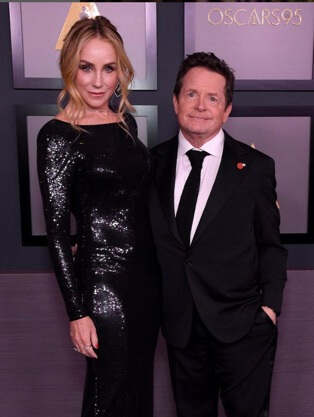Michael J. Fox with his wife. 
